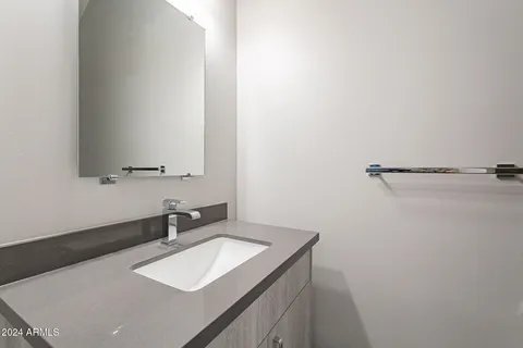 a view of an empty room and a window