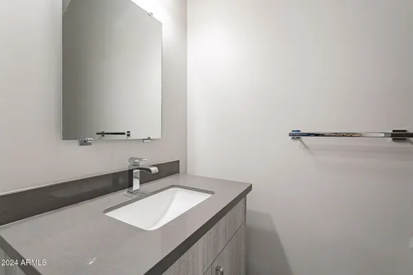 a view of an empty room and a window