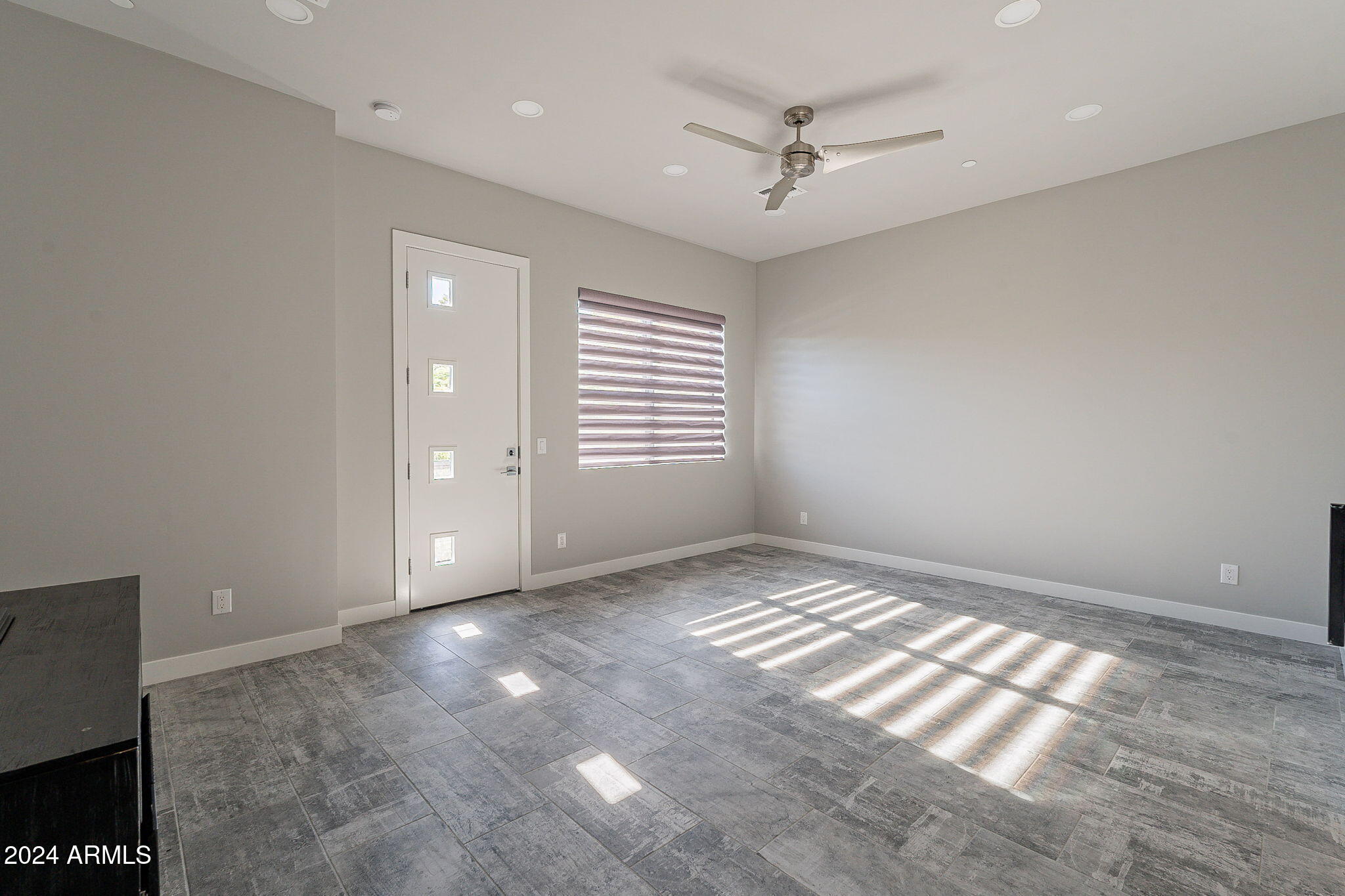 2645 East Osborn Road, Unit 3 Phoenix, AZ 85016 - Photo 16 of 31 a view of an empty room and a window