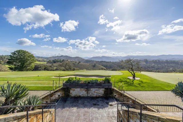 a view of a terrace with sitting area