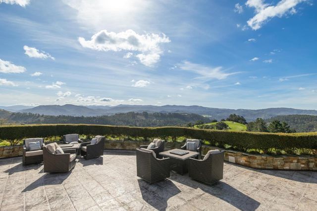 a view of a porch with a sitting area