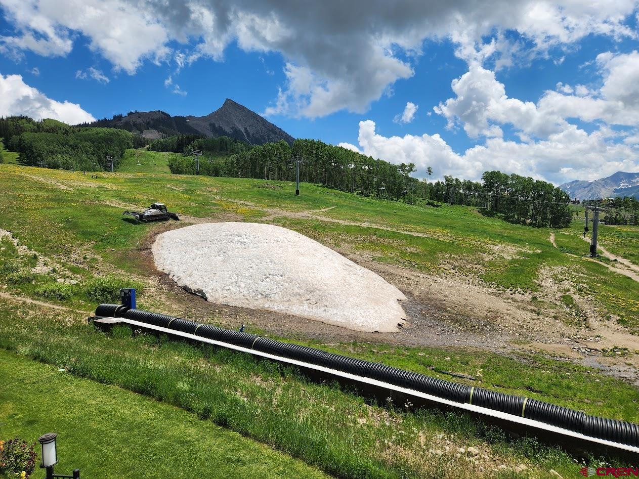31 Crested Mountain Lane, Unit C2 Crested Butte, CO 81225 - Photo 22 of 25 a view of a back yard