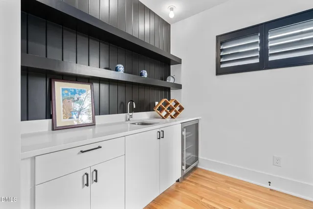 a view of balcony with wooden floor