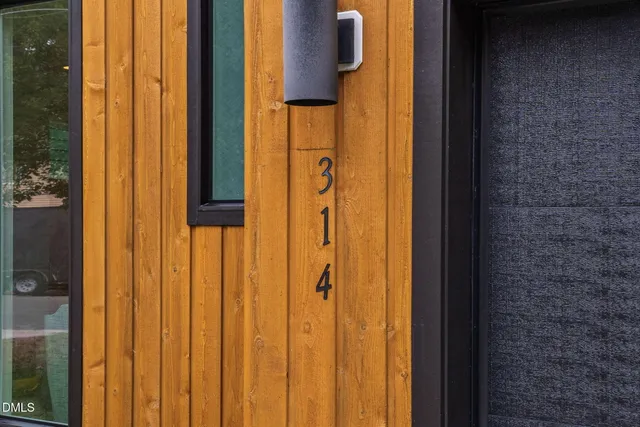 a balcony view with a backyard space