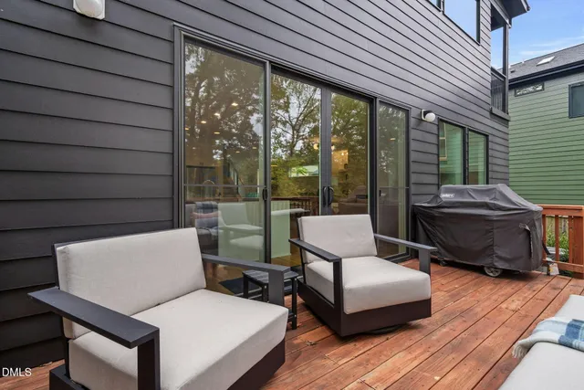 a view of a two chairs in the roof deck