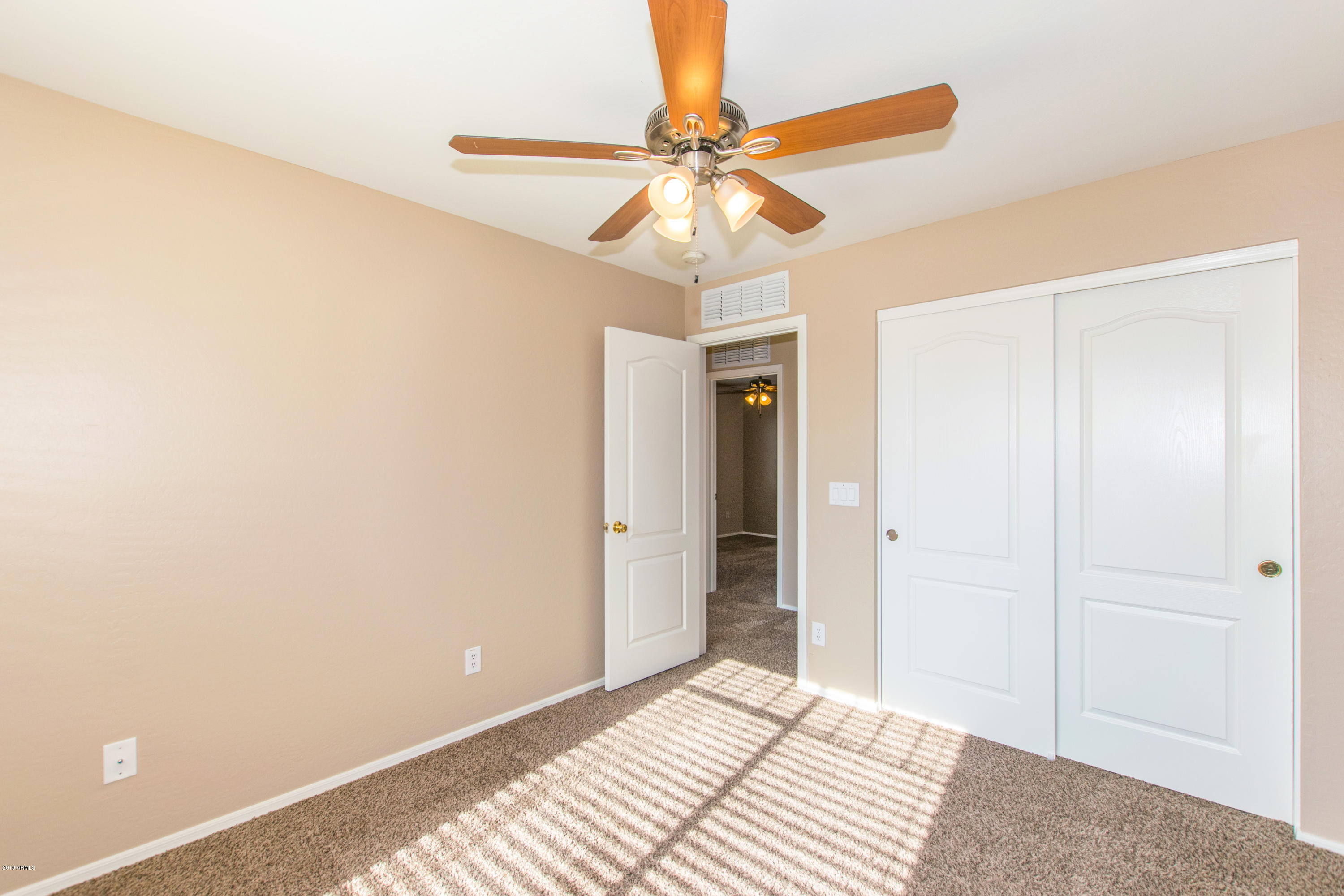 43750 West Magnolia Road Maricopa, AZ 85138 - Photo 18 of 28 a view of an empty room