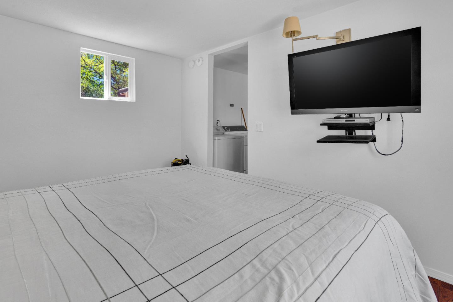 38483 Milpitas Road Greenfield, CA 93927 - Photo 42 of 55 a bedroom with a flat screen tv and a bed
