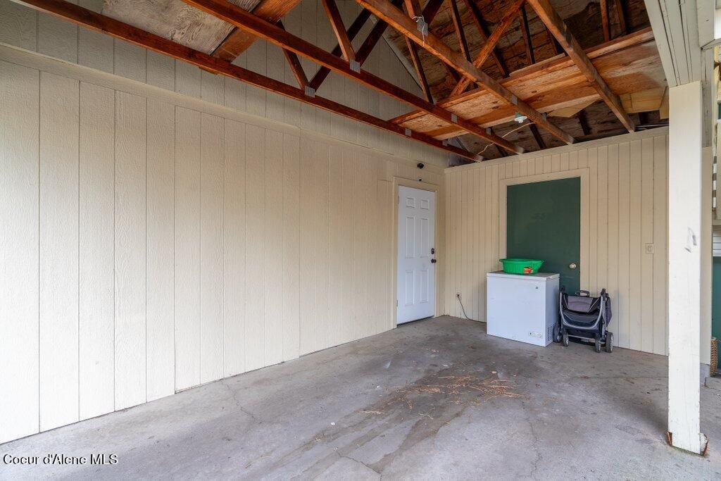 8205 North Ridgewood Drive, Unit 3 Hayden, ID 83835 - Photo 16 of 19 Desiganted Carport and storage locker