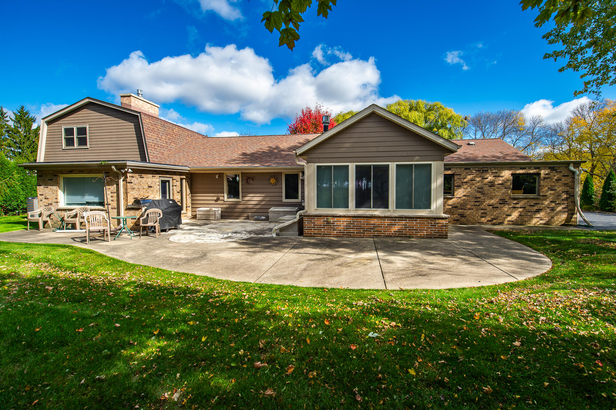 4024 South Brook Road Caledonia, WI 53126 - Photo 41 of 66 Large patio and backyard provides ample room for entertaining