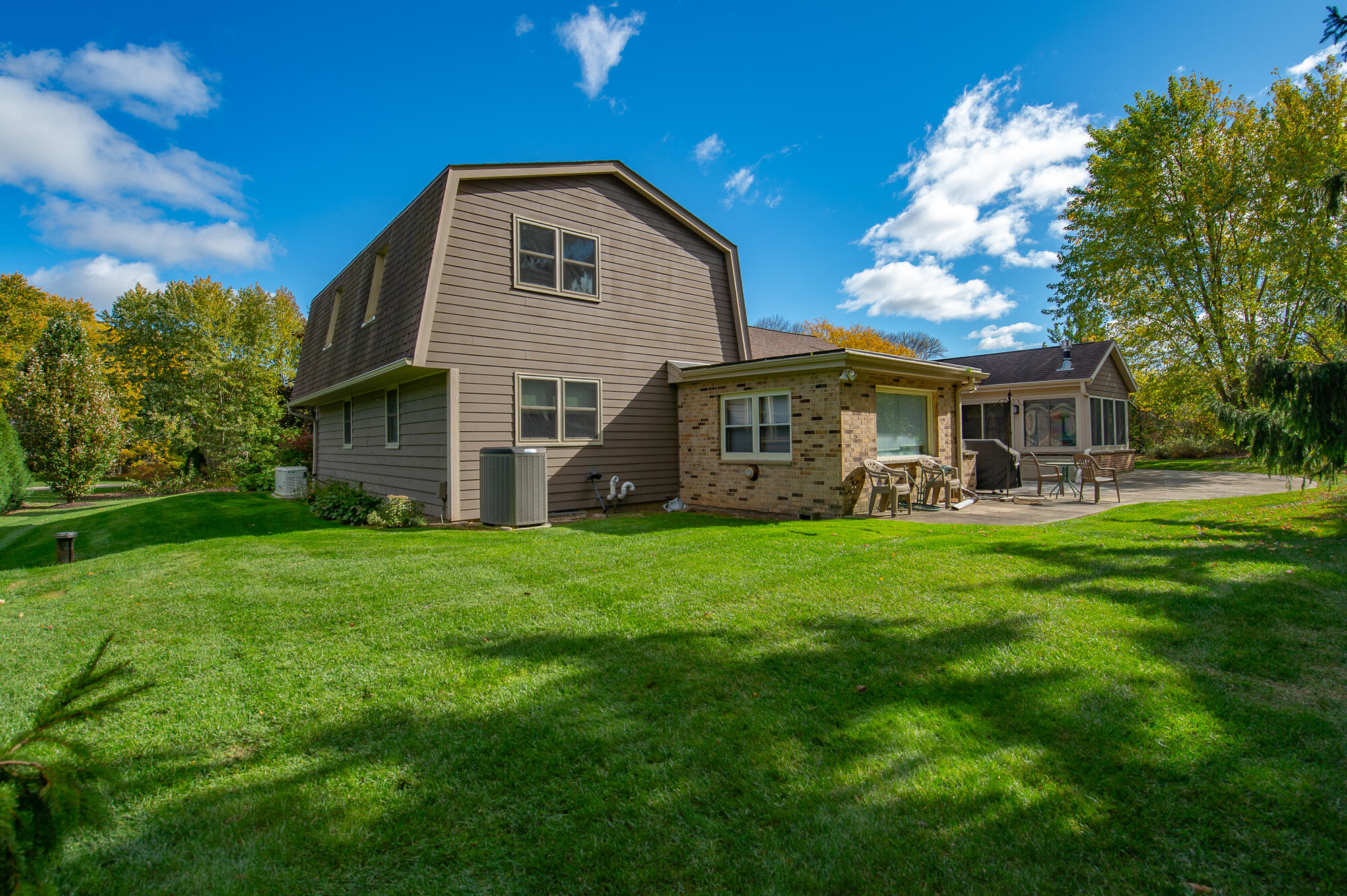4024 South Brook Road Caledonia, WI 53126 - Photo 45 of 66 Large backyard with view of back of house looking east