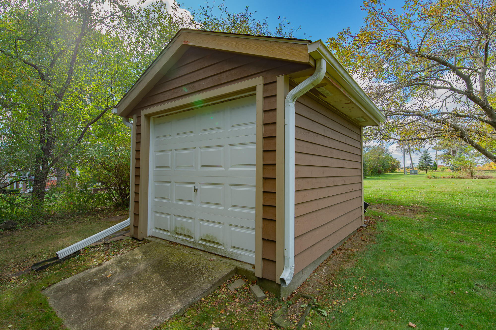 4024 South Brook Road Caledonia, WI 53126 - Photo 47 of 66 New shed erected in 2017 provides room for lawn equipment and tools