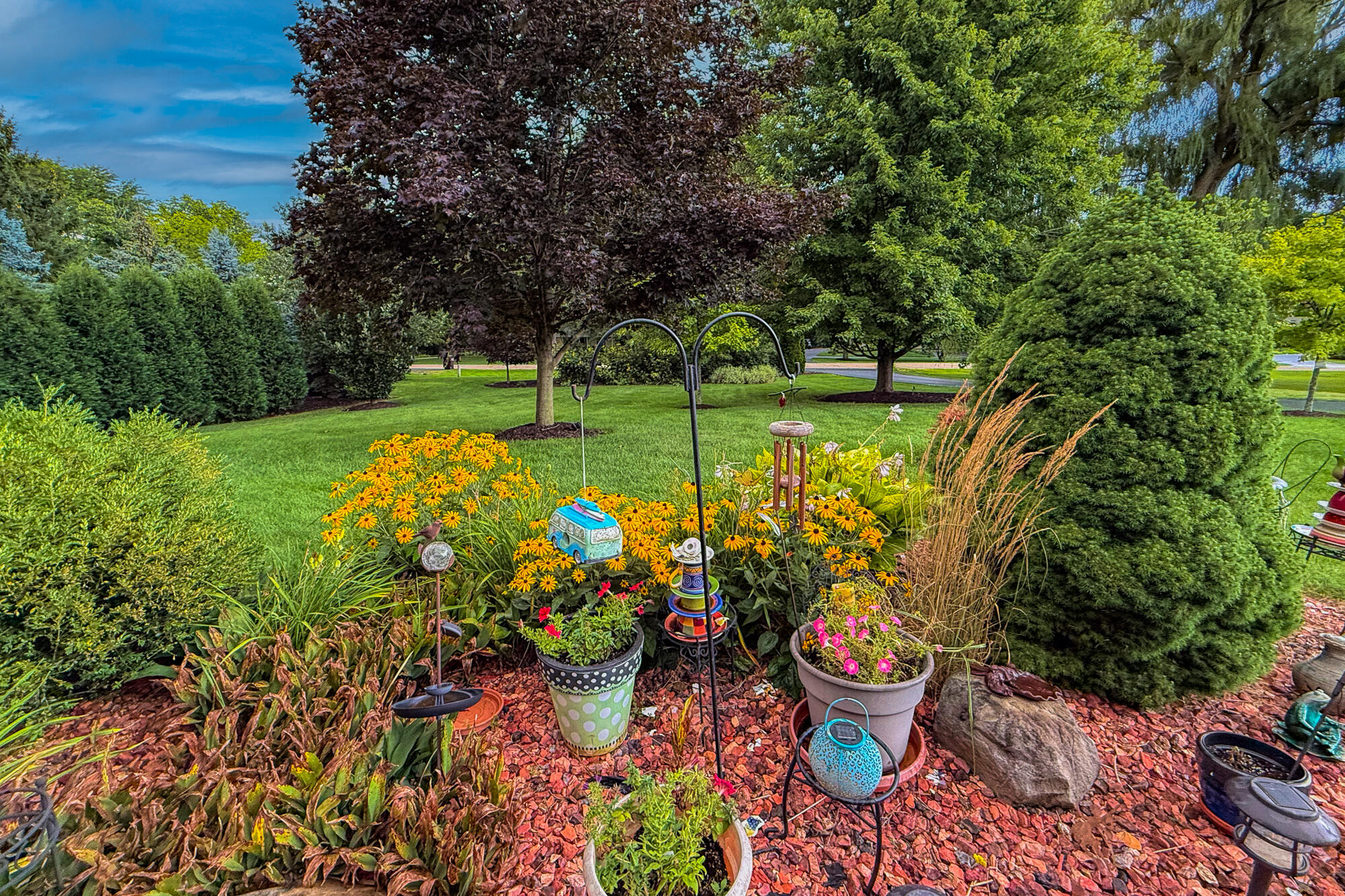 4024 South Brook Road Caledonia, WI 53126 - Photo 54 of 66 Summer flowers in front yard