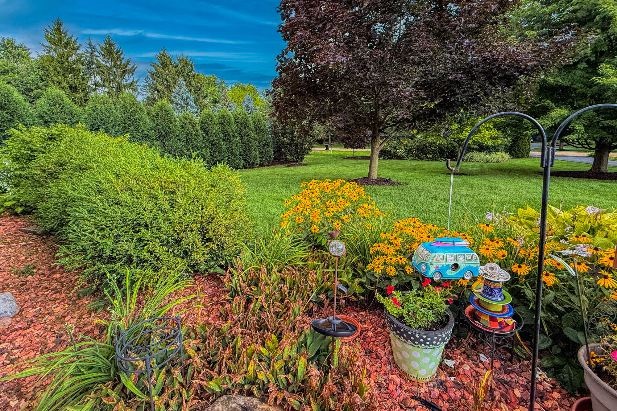 4024 South Brook Road Caledonia, WI 53126 - Photo 55 of 66 Bushes and summer flowers in front yard