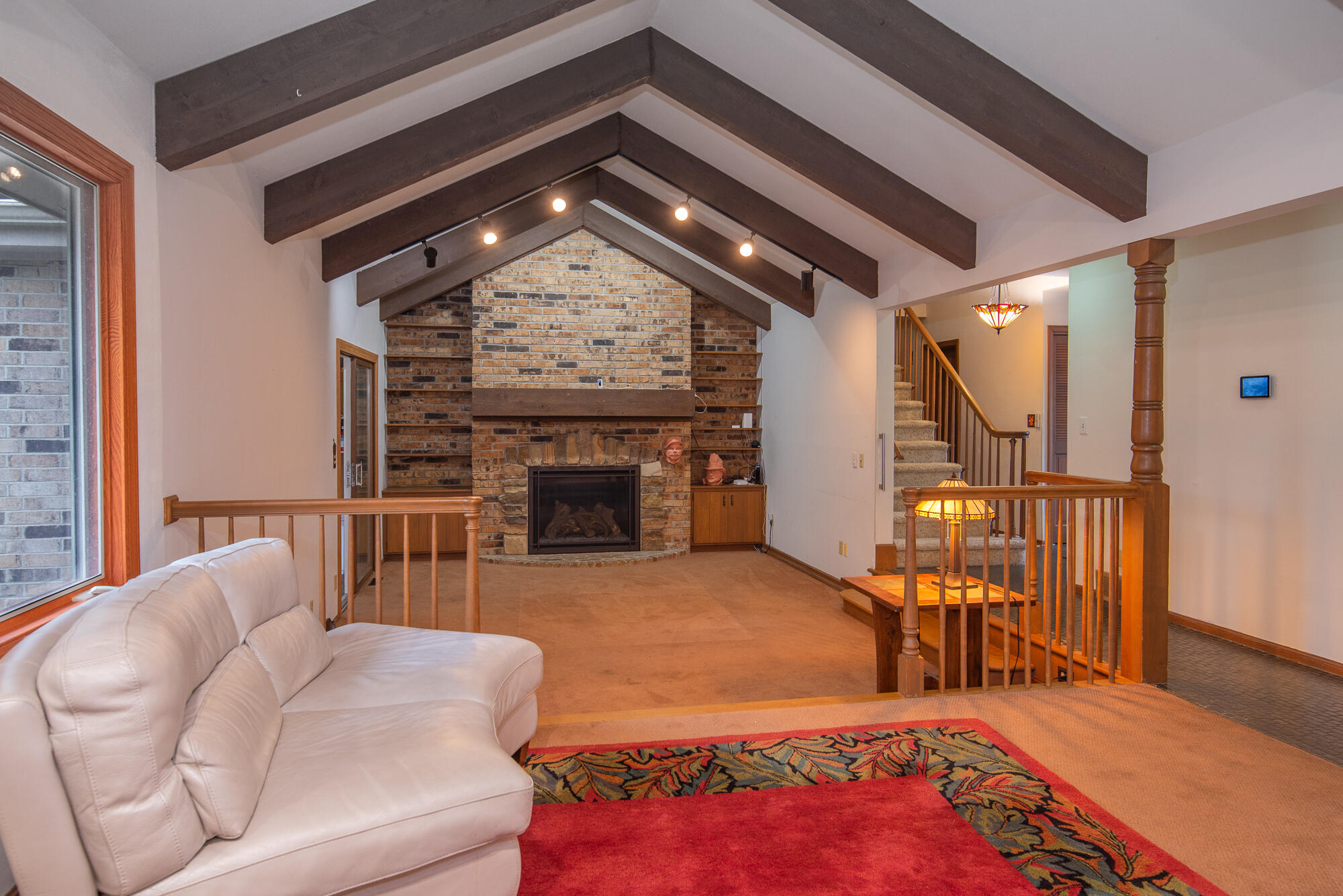 4024 South Brook Road Caledonia, WI 53126 - Photo 4 of 66 Great Room with cathedral ceilings and gas fireplace