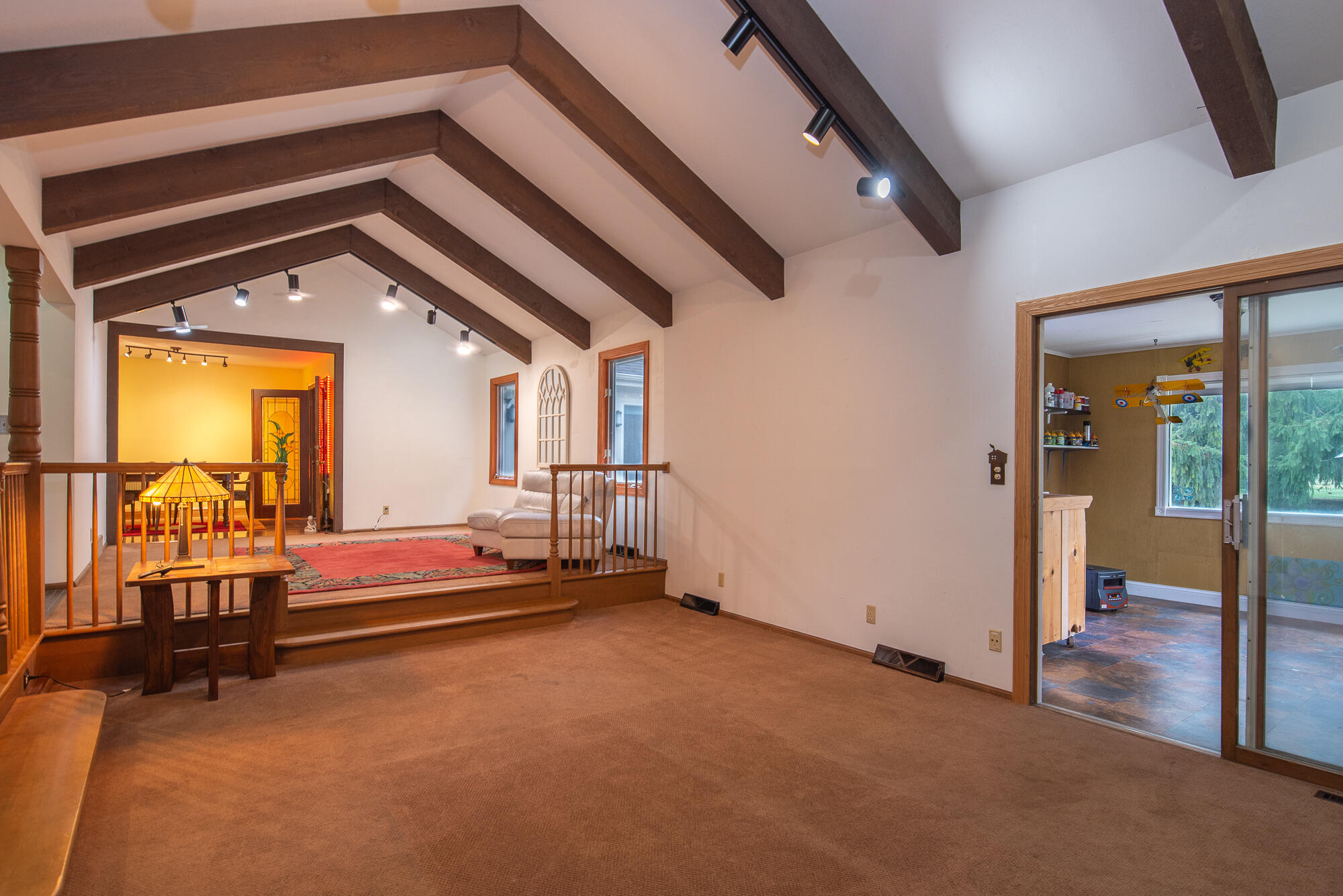 4024 South Brook Road Caledonia, WI 53126 - Photo 6 of 66 Great Room view entry to Three Season Room and Dining Room area