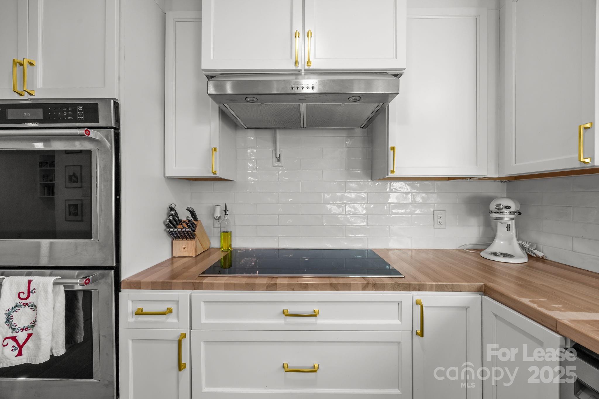 4611 Kiser Island Road Terrell, NC 28682 - Photo 12 of 40 a kitchen with a sink and cabinets