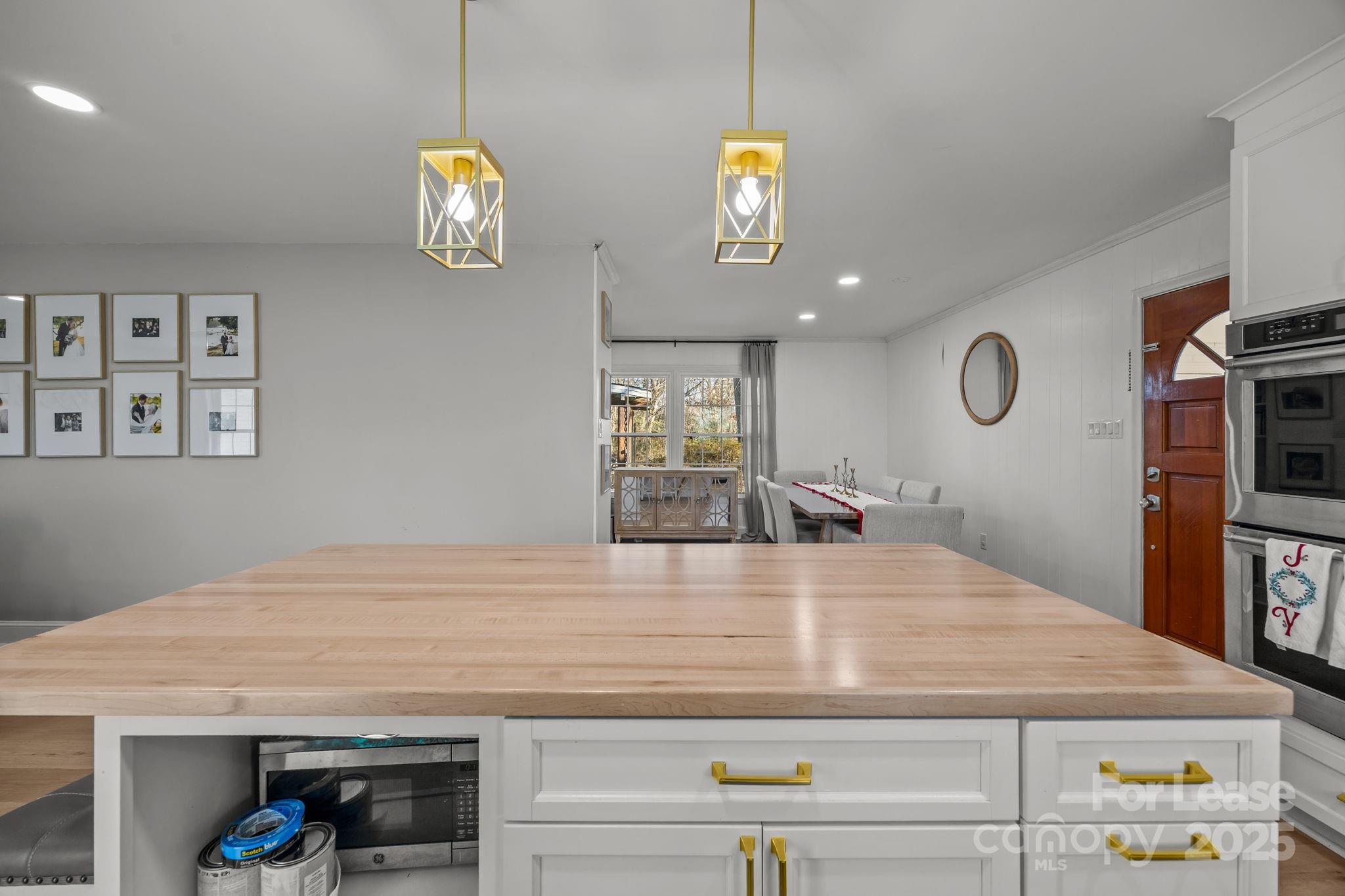 4611 Kiser Island Road Terrell, NC 28682 - Photo 15 of 40 a view of kitchen island with wooden floor