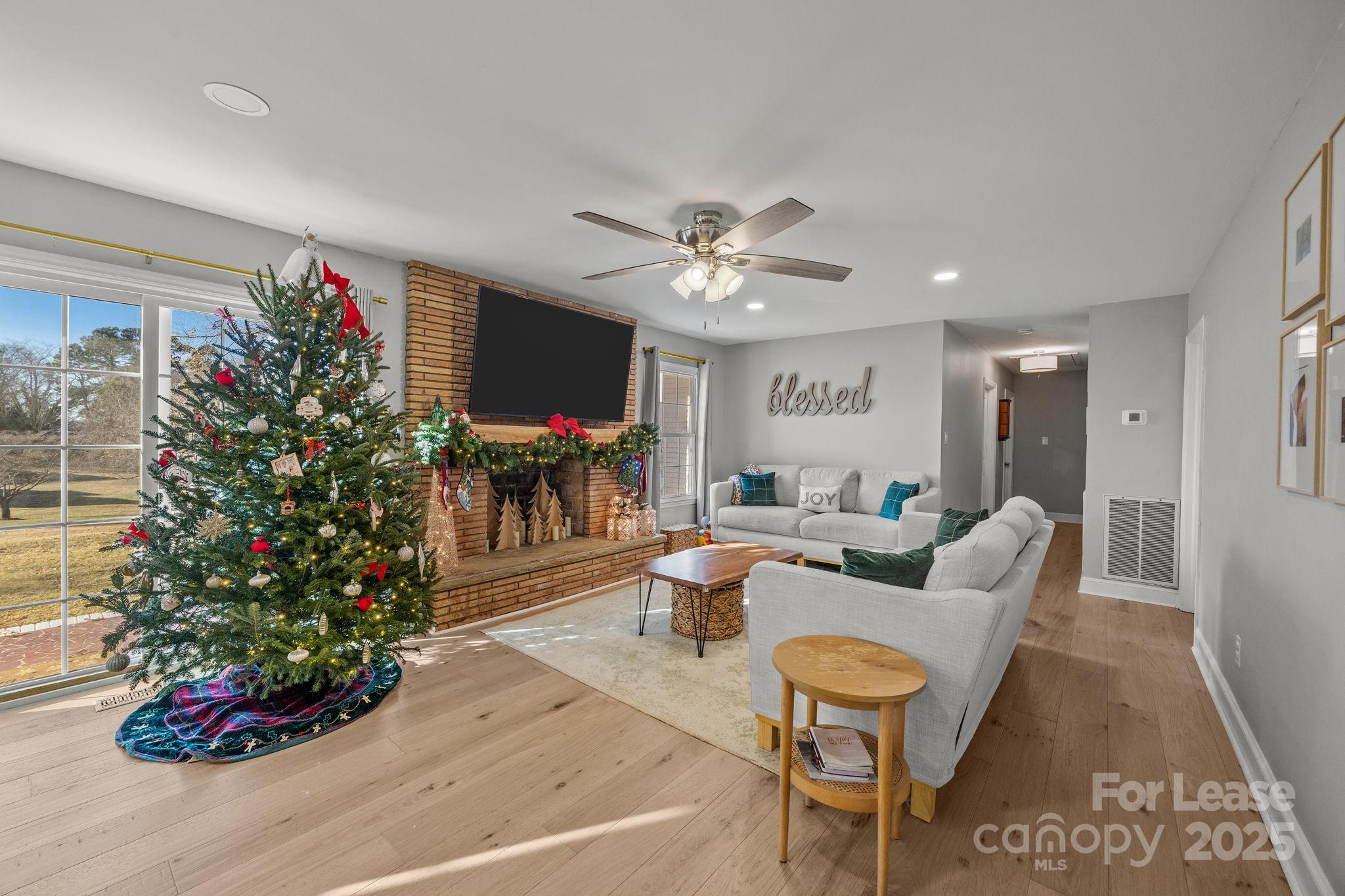 4611 Kiser Island Road Terrell, NC 28682 - Photo 20 of 40 a living room with furniture and flowers