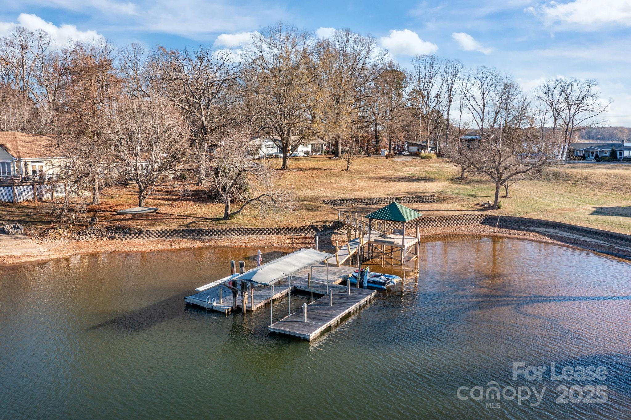 4611 Kiser Island Road Terrell, NC 28682 - Photo 2 of 40 a swimming pool with outdoor seating and yard