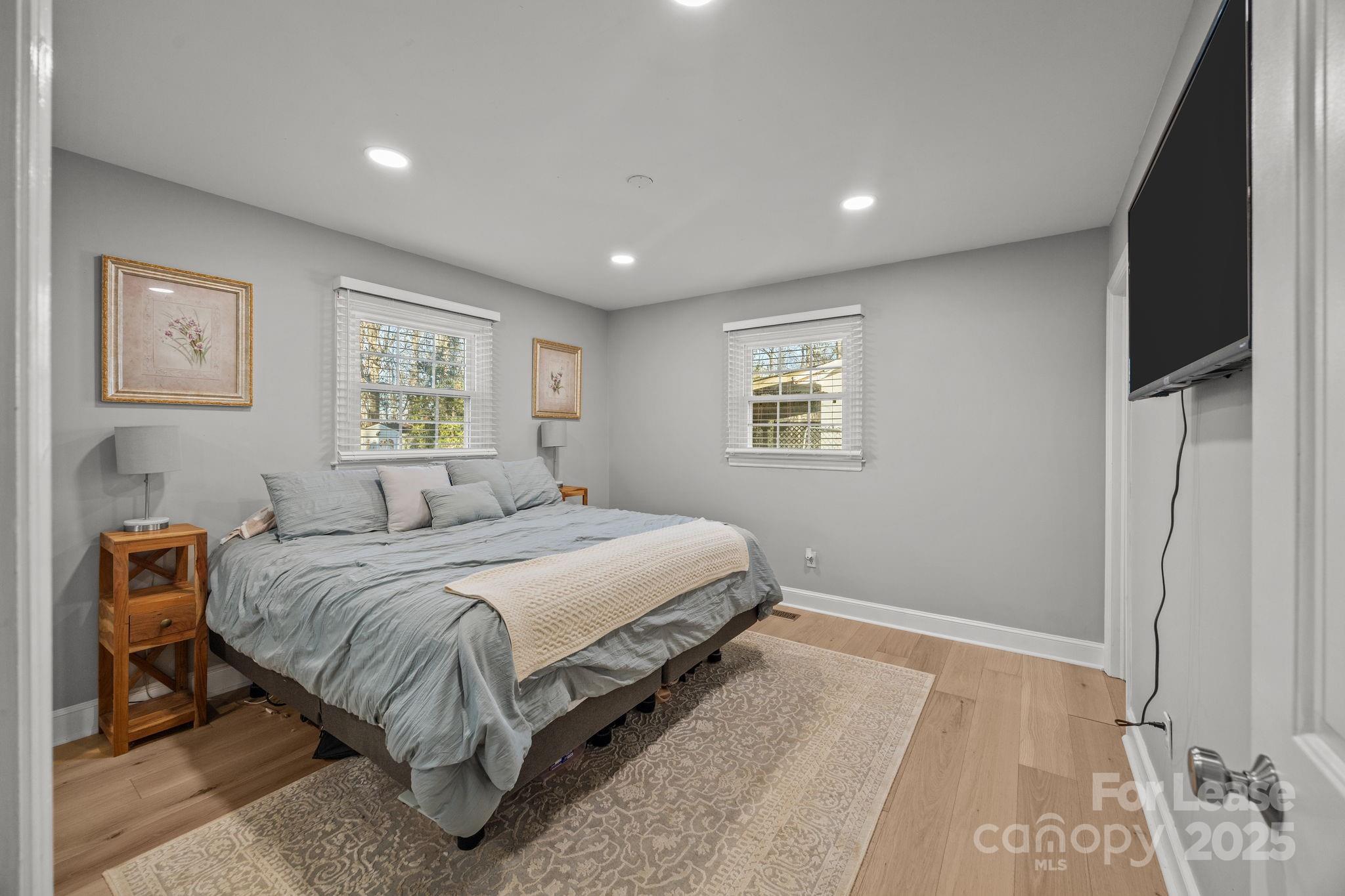 4611 Kiser Island Road Terrell, NC 28682 - Photo 26 of 40 a bedroom with a large bed and a window