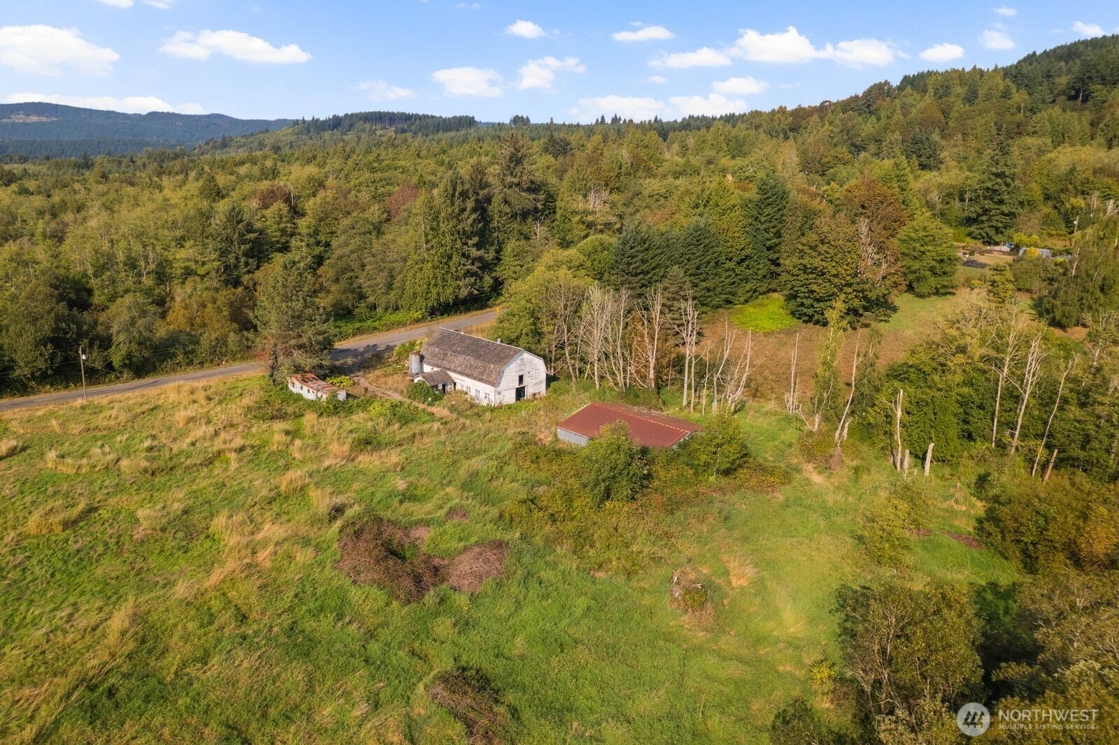 21314 Starbird Road Mount Vernon, WA 98274 - Photo 16 of 35 a view of an outdoor space and mountain view