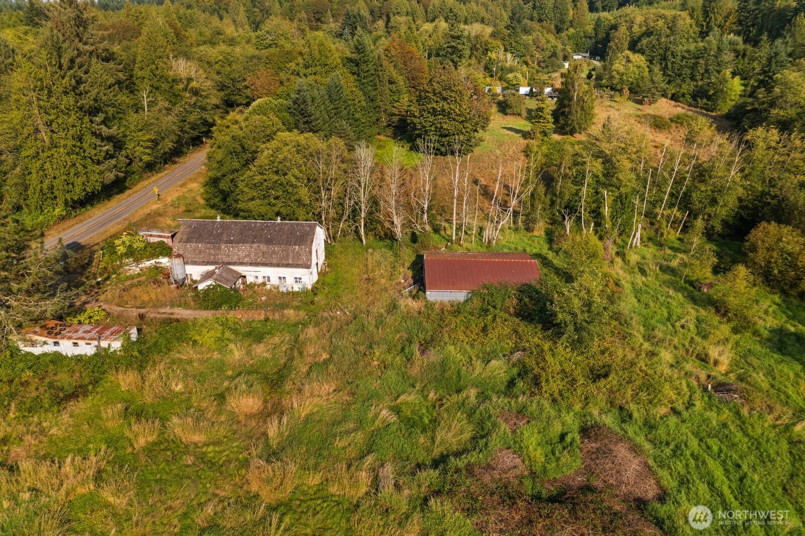 21314 Starbird Road Mount Vernon, WA 98274 - Photo 21 of 35 a view of a yard with an outdoor space