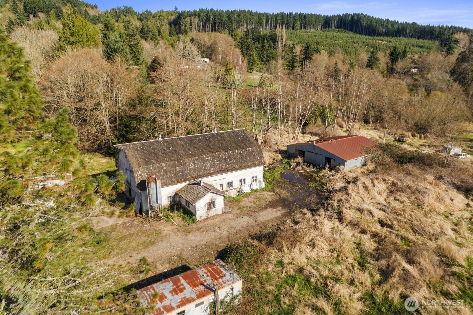 21314 Starbird Road Mount Vernon, WA 98274 - Photo 31 of 35 an aerial view of house with yard and mountain view in back