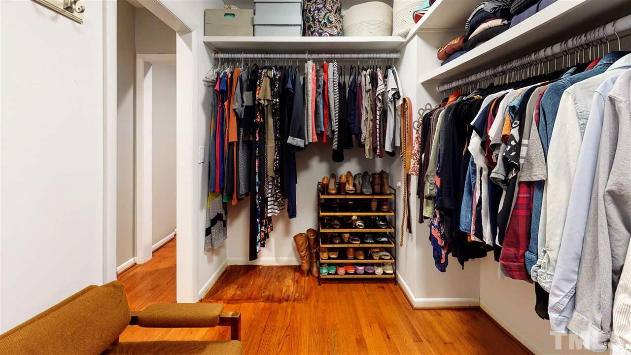 4212 Windsor Place Raleigh, NC 27609 - Photo 11 of 30 a view of walk in closet with clothes and shoes