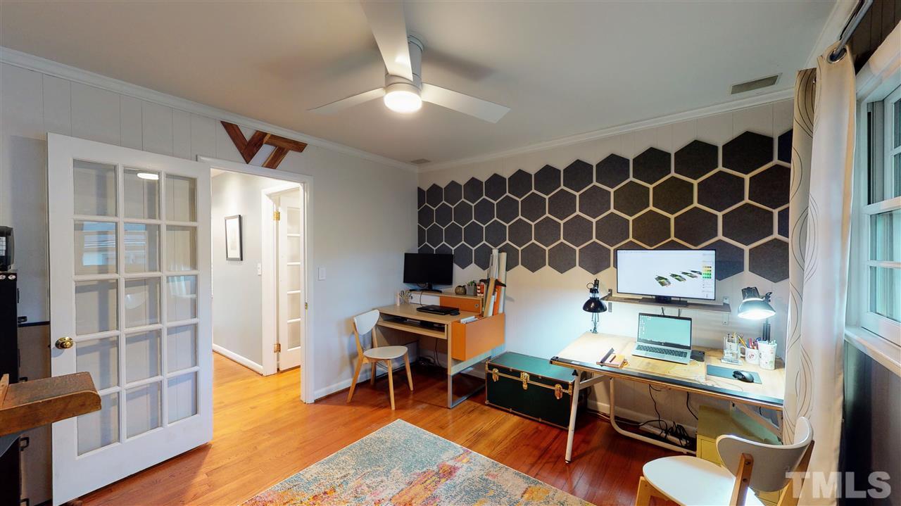 4212 Windsor Place Raleigh, NC 27609 - Photo 21 of 30 a workspace with wooden floor and furniture