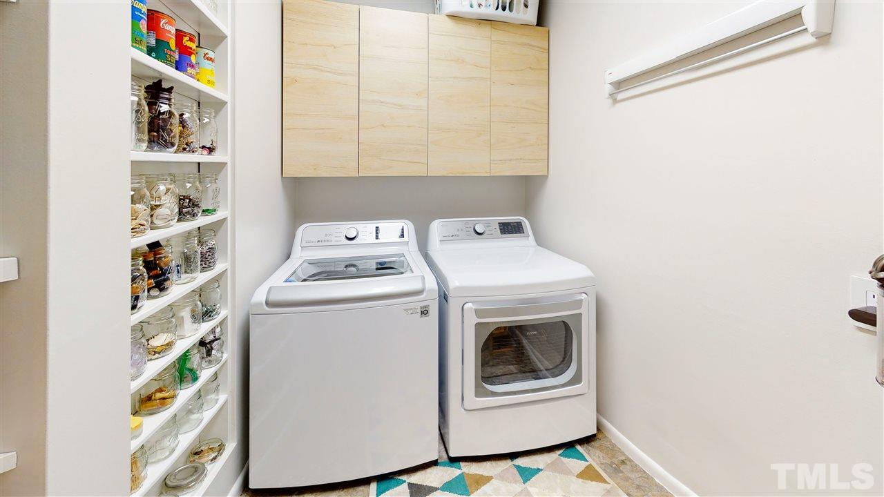 4212 Windsor Place Raleigh, NC 27609 - Photo 25 of 30 a utility room with dryer and washer