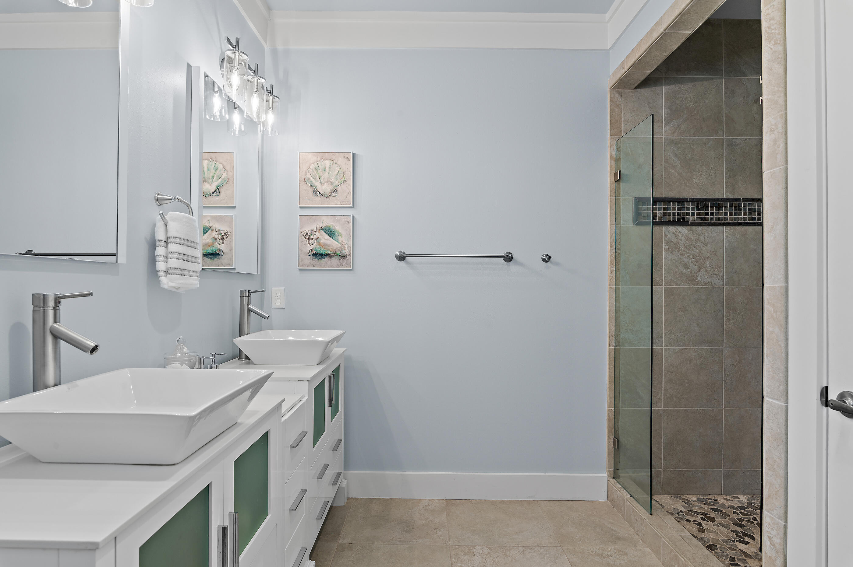 104 Spotted Dolphin Road Santa Rosa Beach, FL 32459 - Photo 21 of 42 a bathroom with a sink a mirror and a shower