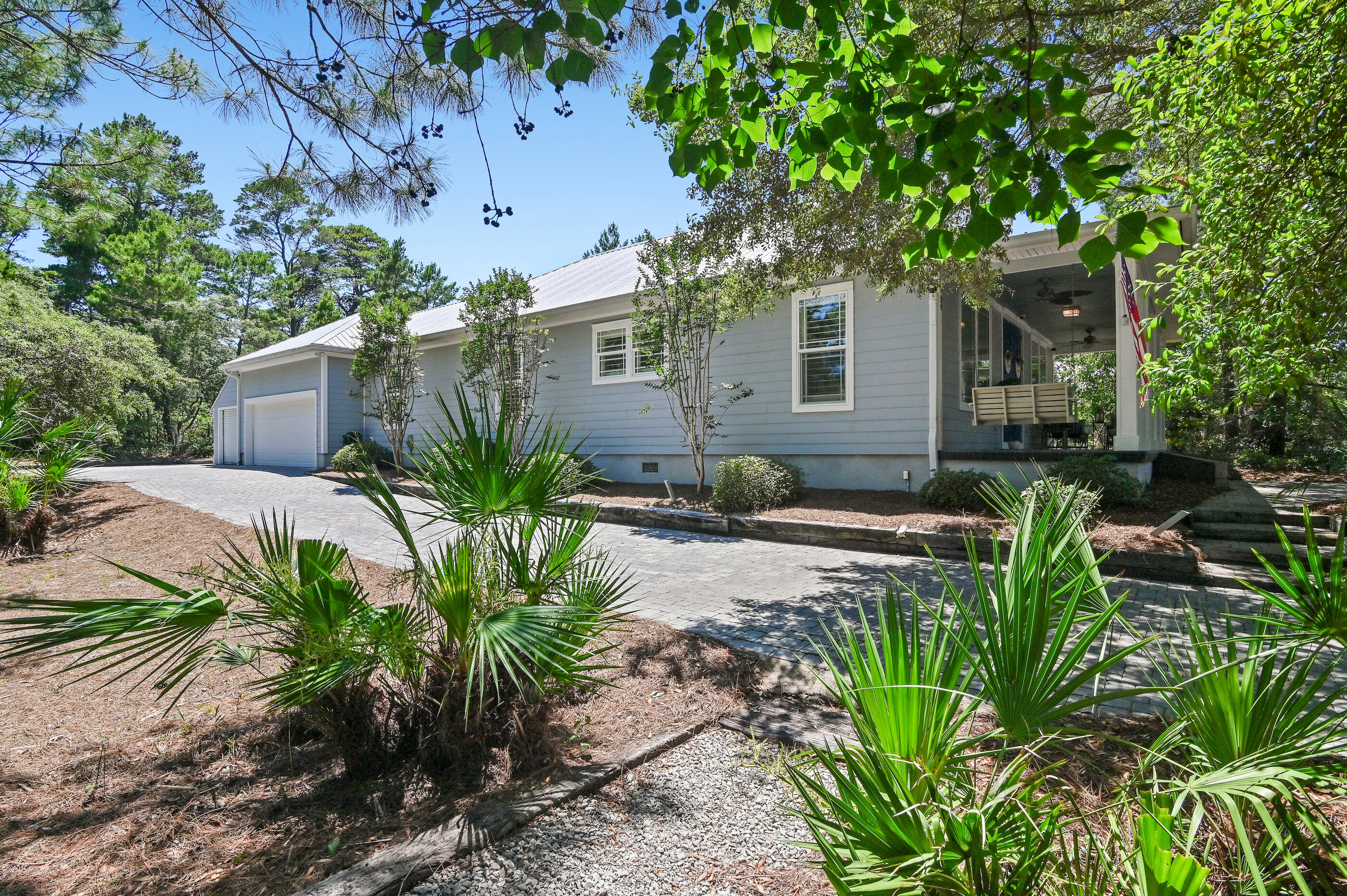 104 Spotted Dolphin Road Santa Rosa Beach, FL 32459 - Photo 34 of 42 a view of backyard with outdoor seating and plants