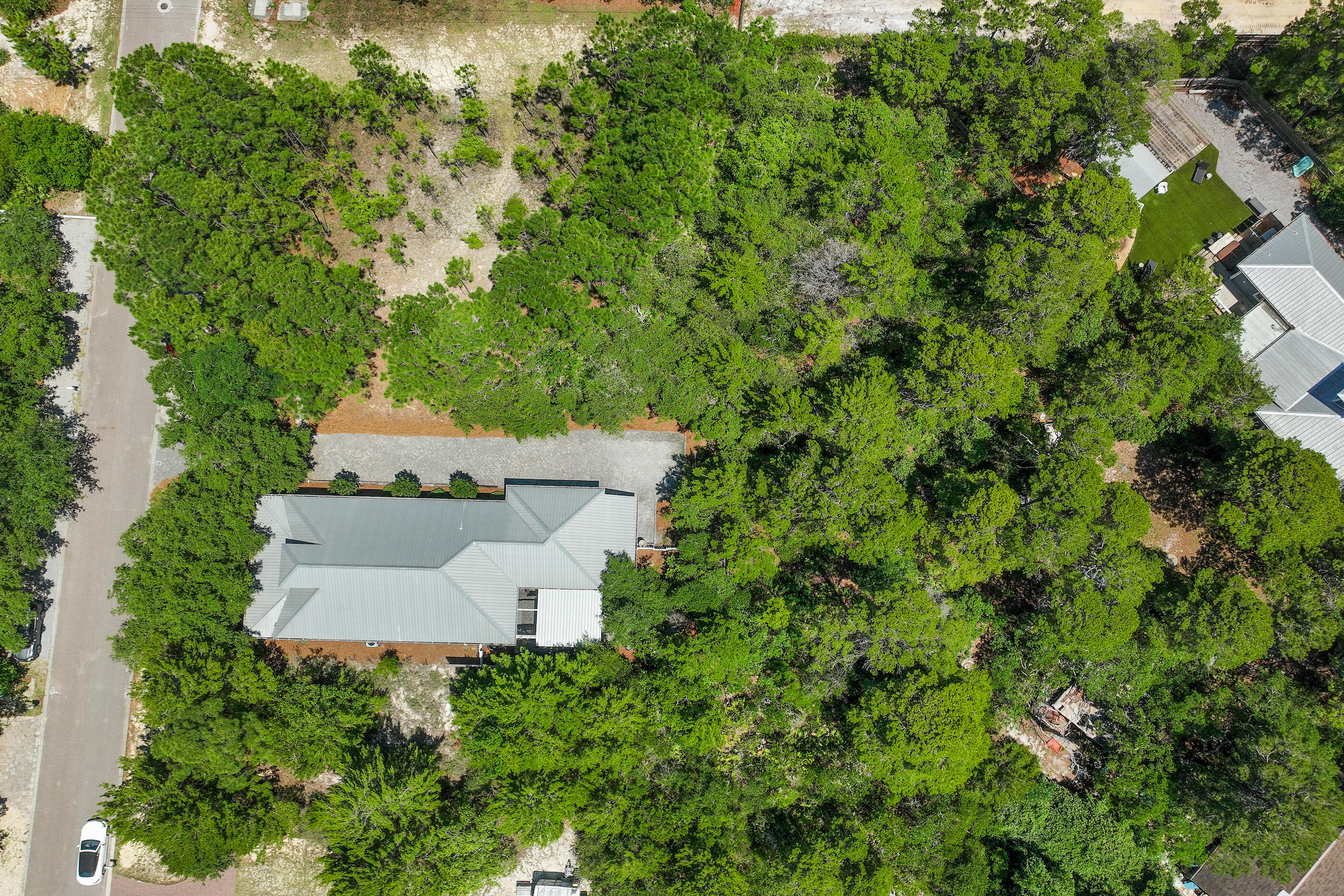 104 Spotted Dolphin Road Santa Rosa Beach, FL 32459 - Photo 39 of 42 an aerial view of a house with a yard