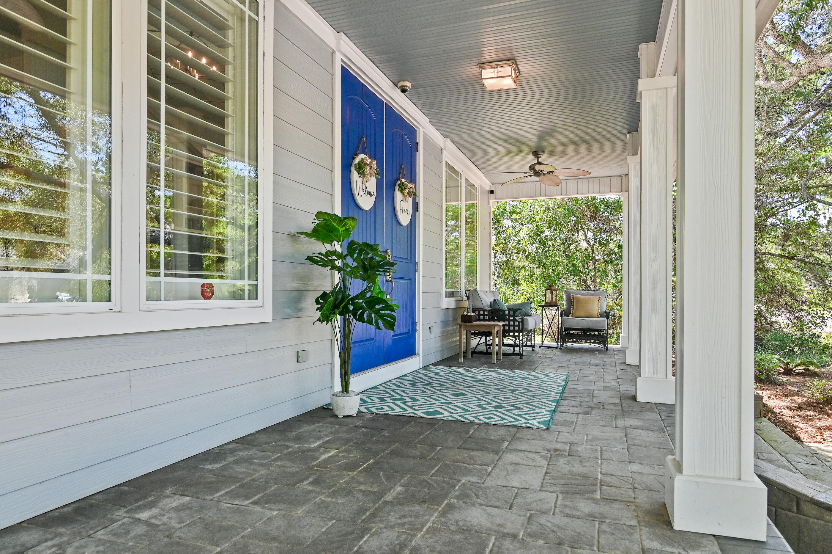 104 Spotted Dolphin Road Santa Rosa Beach, FL 32459 - Photo 8 of 42 a backyard of a house with outdoor seating