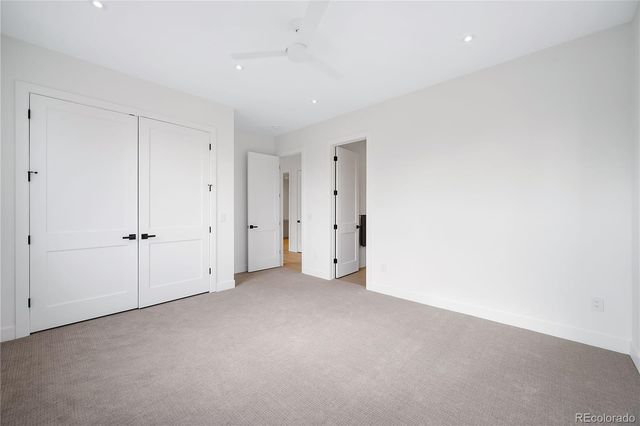 a bathroom with a shower and a toilet