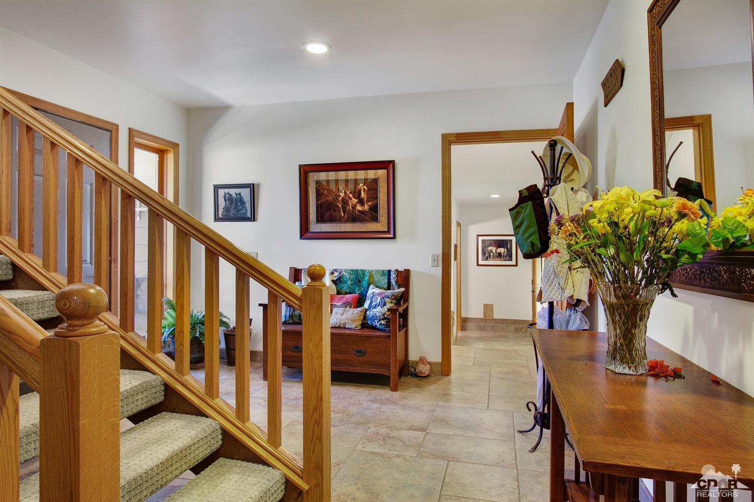 35945 Tool Box Spring Road Mountain Center, CA 92561 - Photo 5 of 53 a living room with furniture and flowers