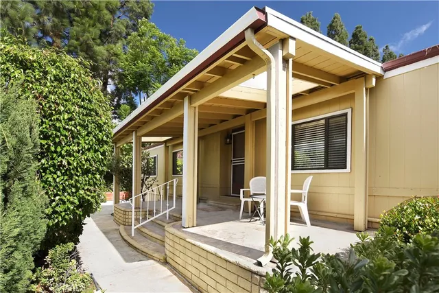 a view of a house with a small porch