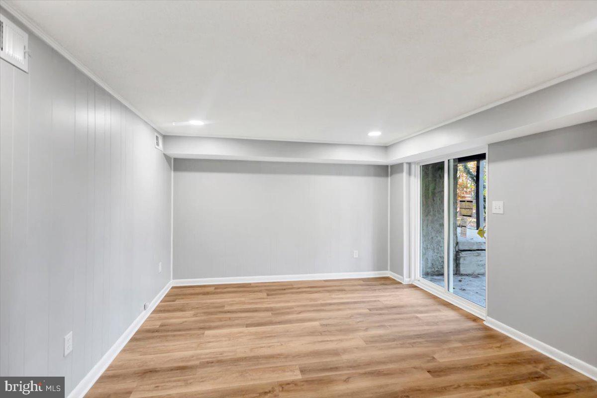 12 Stone Ridge Court Baltimore, MD 21239 - Photo 26 of 38 a view of an empty room