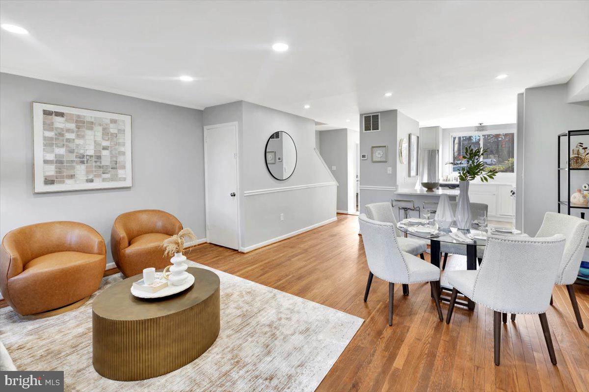 12 Stone Ridge Court Baltimore, MD 21239 - Photo 4 of 38 a dining room with furniture and wooden floor