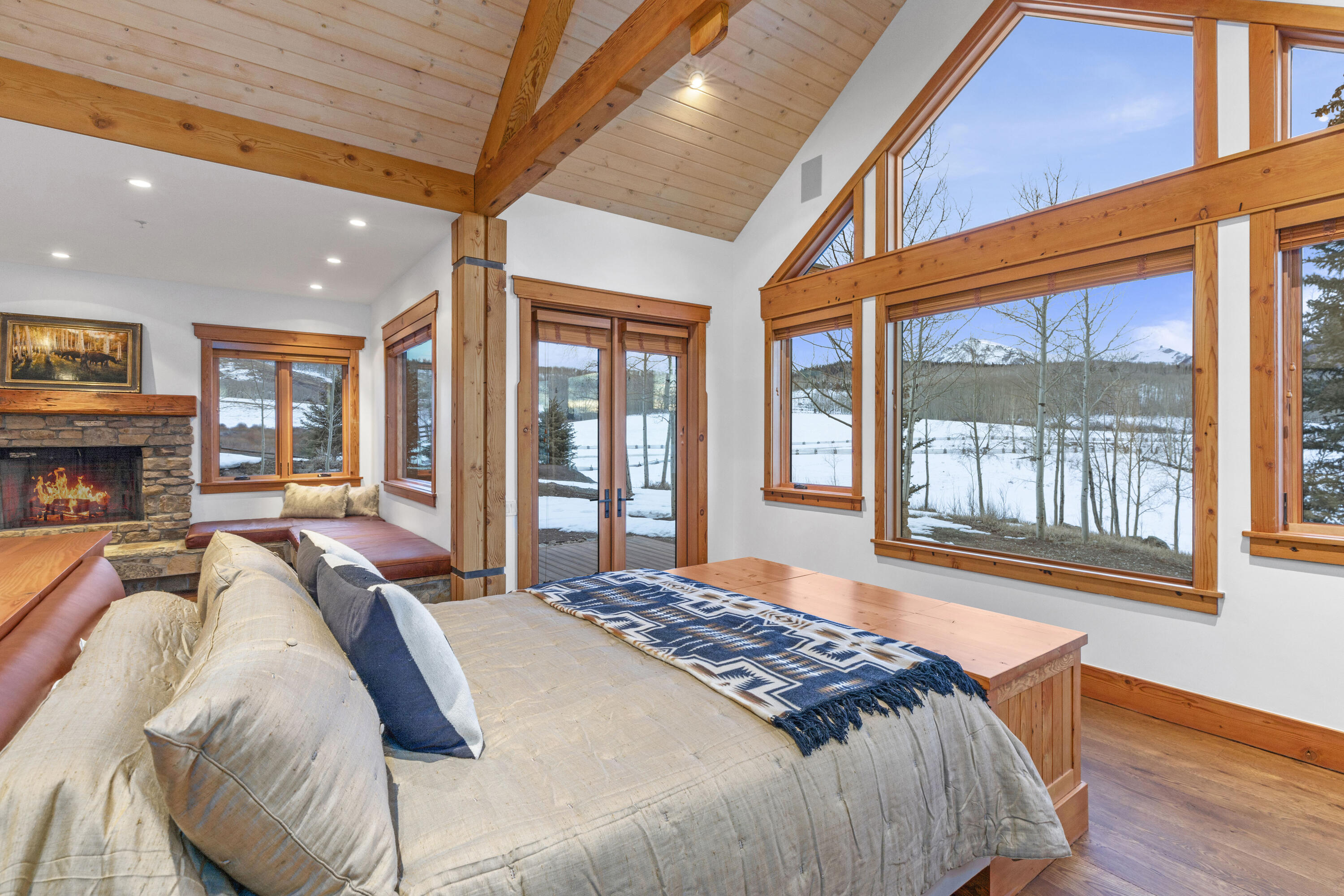 6800 County Road Telluride, CO 81435 - Photo 26 of 64 a bed sitting in a spacious bedroom next to a window