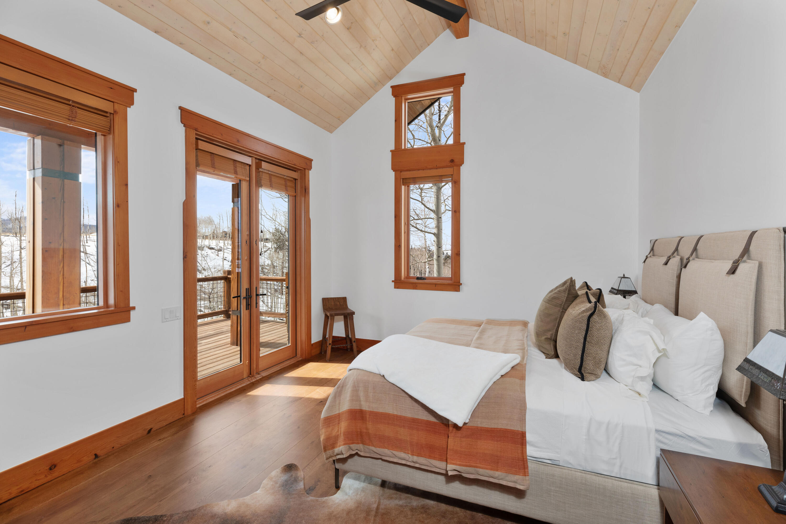 6800 County Road Telluride, CO 81435 - Photo 35 of 64 a bedroom with furniture and a window