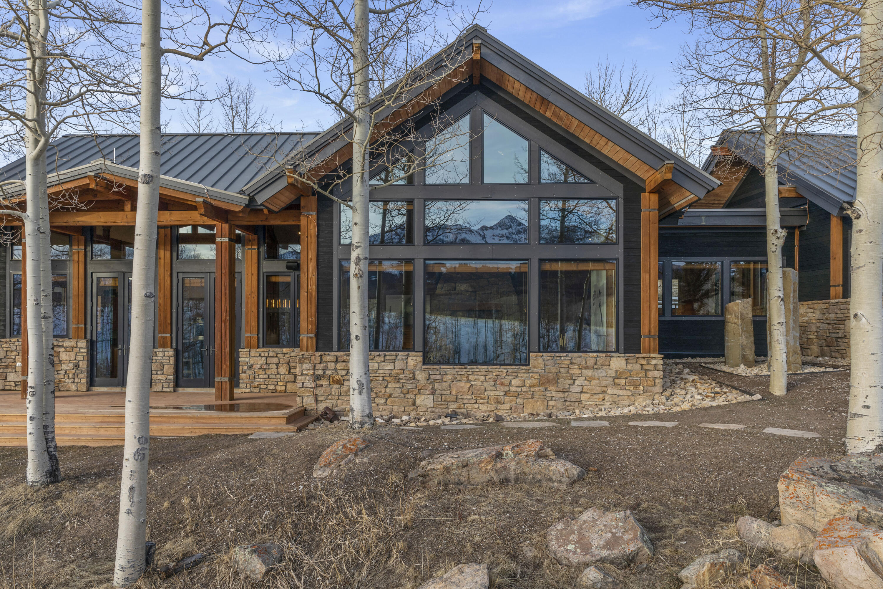 6800 County Road Telluride, CO 81435 - Photo 61 of 64 a front view of a house with a porch