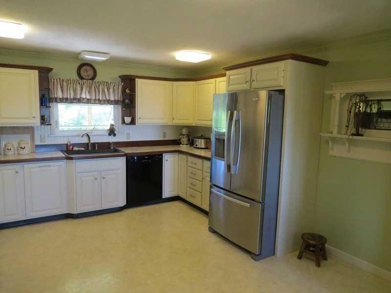 760 Pond Road Sidney, ME 04330 - Photo 10 of 34 Kitchen. Brand new refrigerator is...