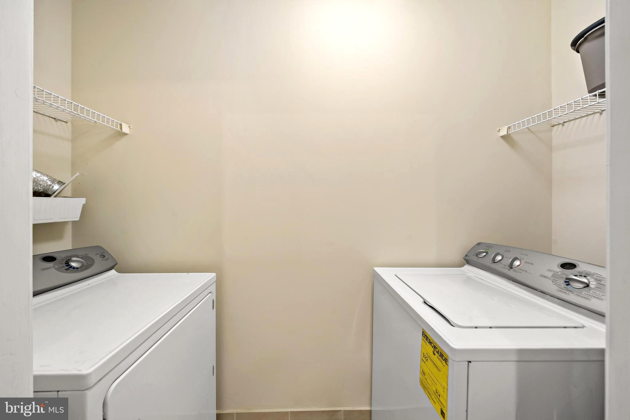 1600 Arch Street, Unit 1116 Philadelphia, PA 19103 - Photo 13 of 23 a utility room with dryer and washer