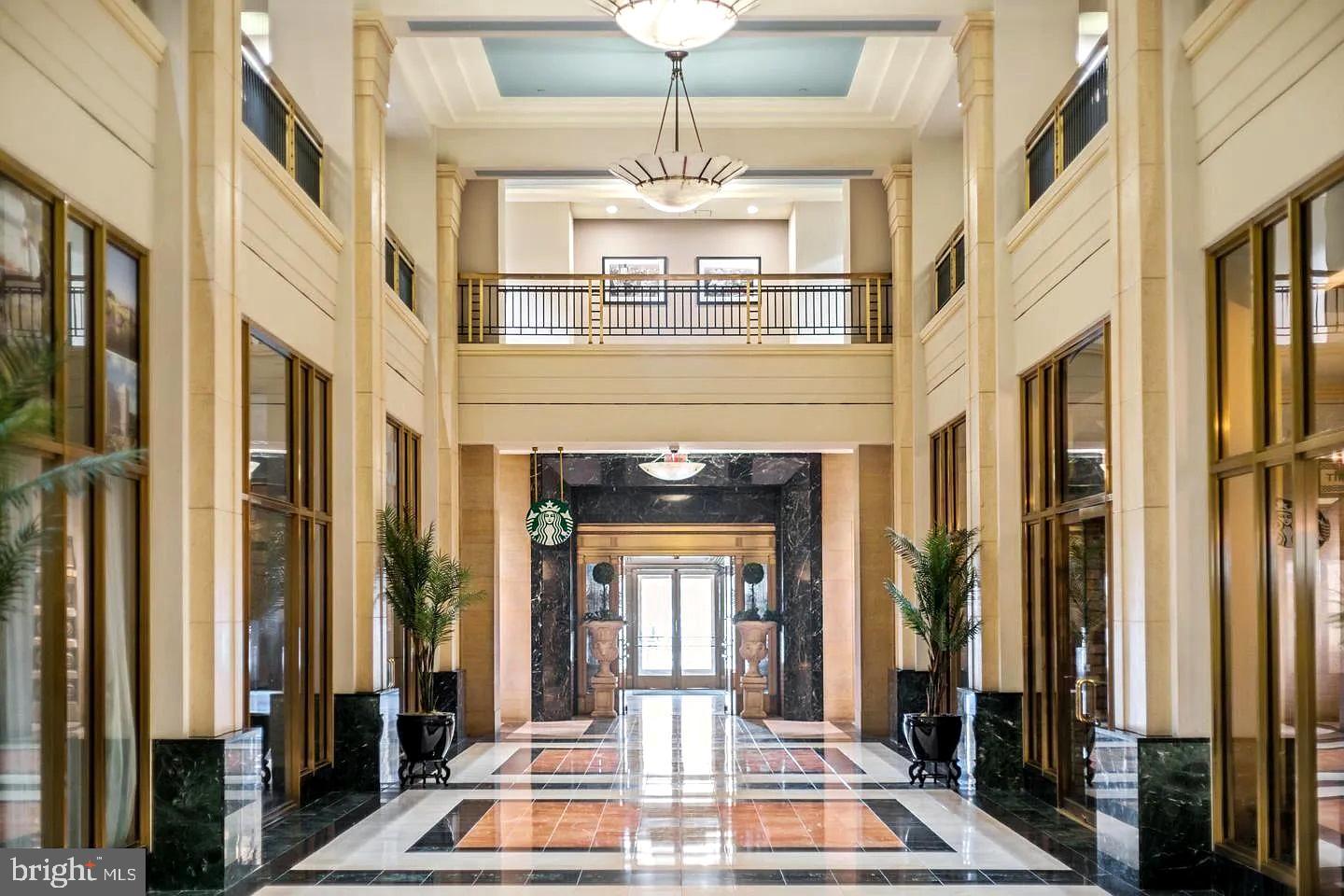 1600 Arch Street, Unit 1116 Philadelphia, PA 19103 - Photo 17 of 23 a view of an entryway with a chandelier