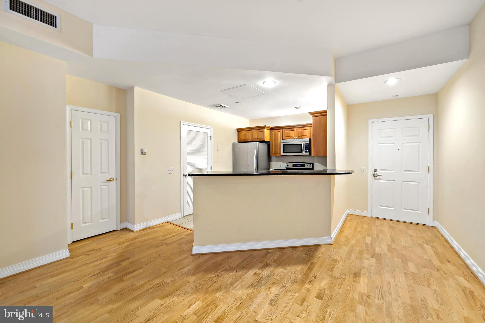 1600 Arch Street, Unit 1116 Philadelphia, PA 19103 - Photo 5 of 23 a view of a kitchen with a sink and an oven