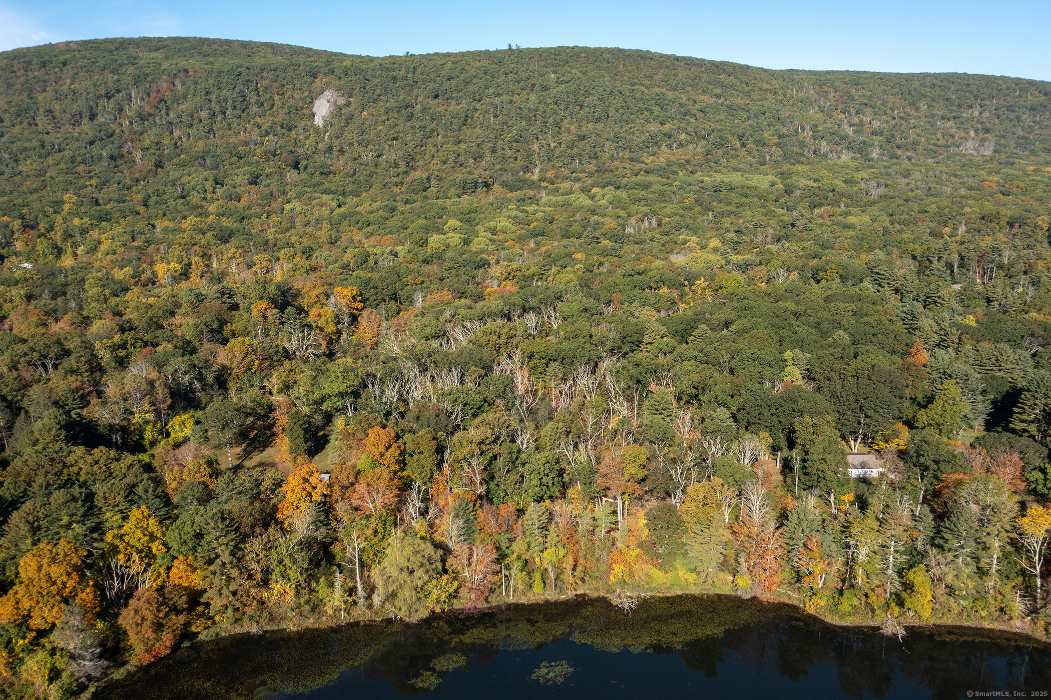 a view of a field with an outdoor space