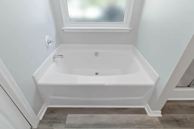 a bathroom with a bathtub
