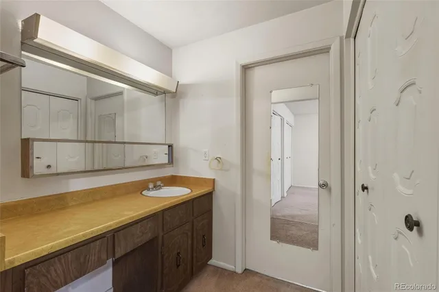 a bathroom with a tub and shower