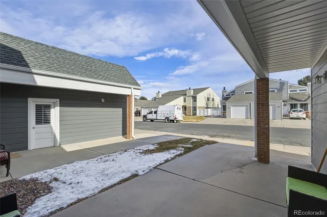 a view of a house with a street